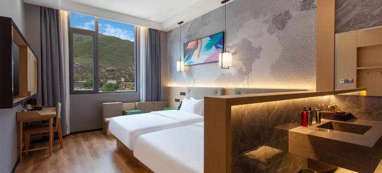 派酒店(巴塘中山广场店)图片