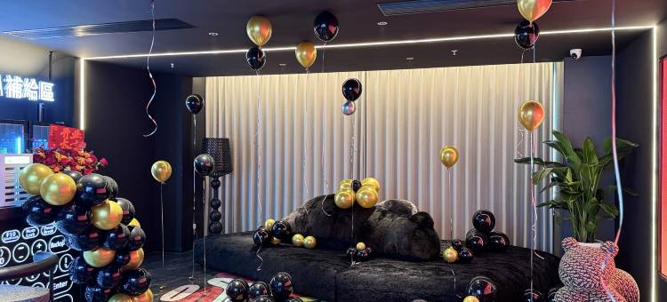 晞悦电竞民宿(泰州万象城店)图片