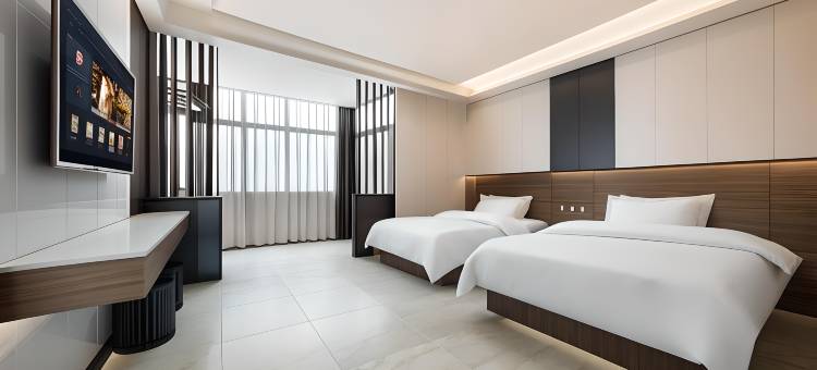 米莱迪智慧电影酒店(万宁王府井免税港神州高铁站店)图片