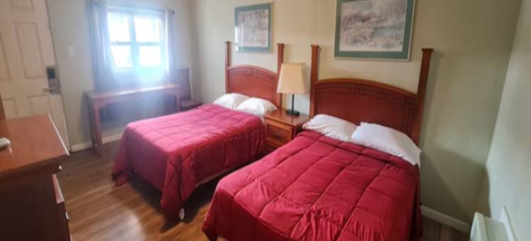 OYO东斯特劳兹堡波科诺斯的Werry's小屋汽车旅馆酒吧(Werry's Cottages Motel & Pub by OYO East Stroudsburg Poconos)图片