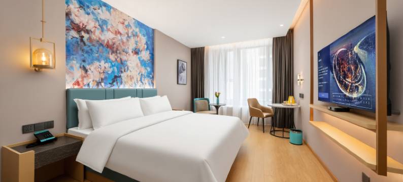 白玉兰商务酒店(青岛东方伊甸园金茂览秀城店)图片