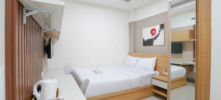 扎瓦尼沙里亚 Rajawali RedPartner Pakuwon购物中心青年旅馆(Dzawani Syariah Rajawali Near Pakuwon Mall RedPartner)图片
