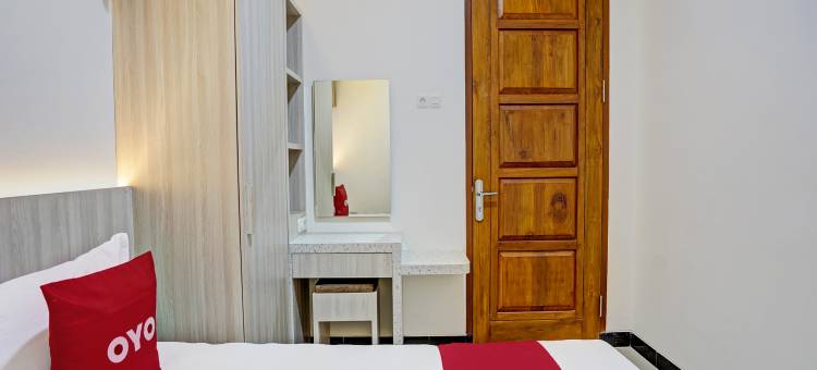 OYO 92209 康戈里科家庭民宿(Kanggo Riko Family Homestay Mitra Reddoorz)图片