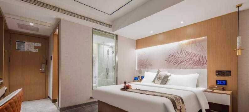 咖曼酒店(万象城六沟垅地铁站店)图片