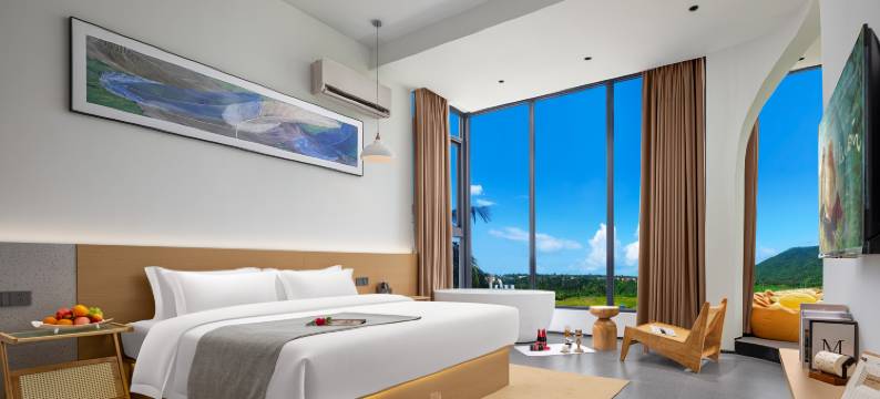 双子民宿(万宁石梅湾商业街旅游公路店)图片