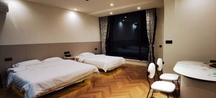 爱琴海缦山76号民宿(蓝白小镇店)图片