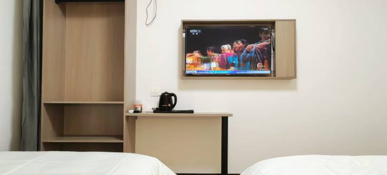 再寓美客酒店(泰山火车站店)图片