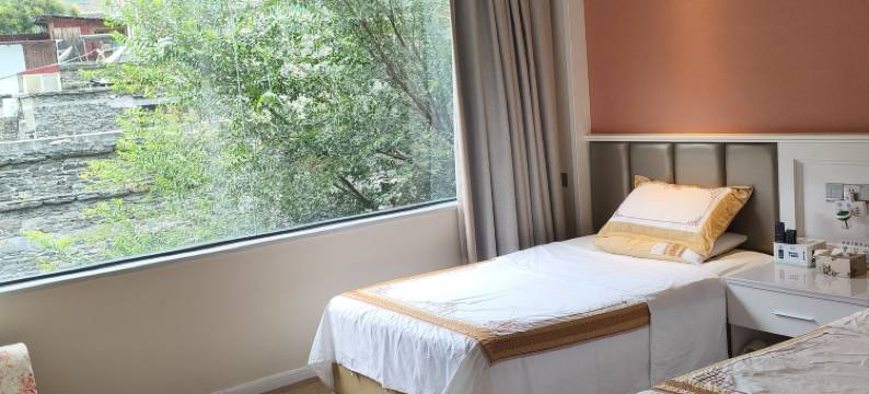 理县水云间酒店(桃坪羌寨景区店)图片