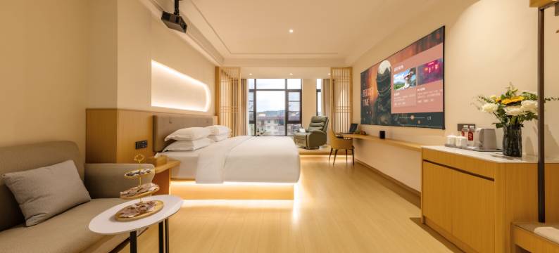 栖岸智能影院酒店(普定玉秀广场店)图片