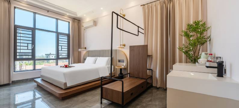 徐闻县誉海澜湾·风车长廊观日瞰海美宿(南极村店)图片