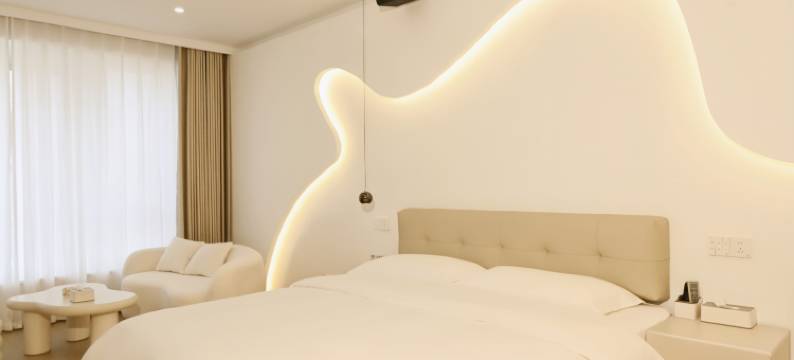 未晚·小栖酒店(蚌埠淮上区义乌商贸城店)图片