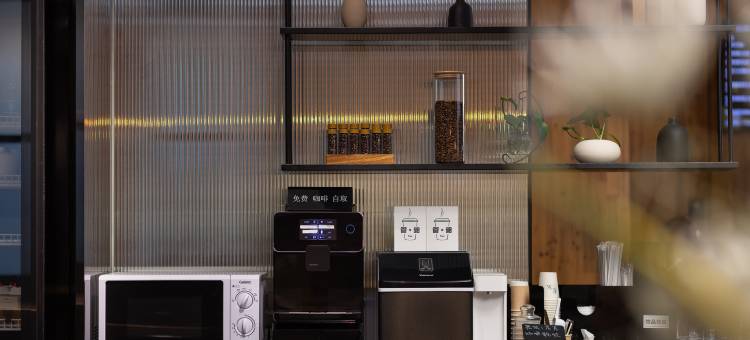素里•见野酒店(广州天河新华学院柯木塱地铁站店)图片