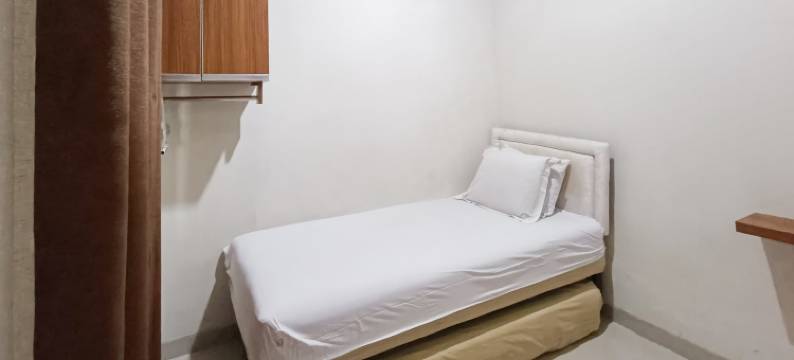 维斯玛阿尔伊曼酒店-由努萨林克管理(Wisma Al Iman Syariah 25 Mitra RedDoorz)图片