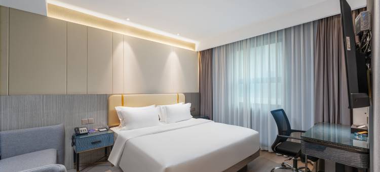 悦森·禧致酒店(城市中心广场老达一中店)图片