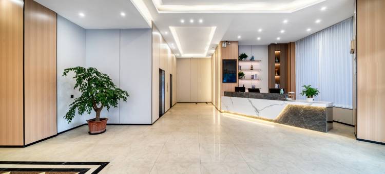 回禾新中心酒店(台州路桥十里长街中盛广场店)图片