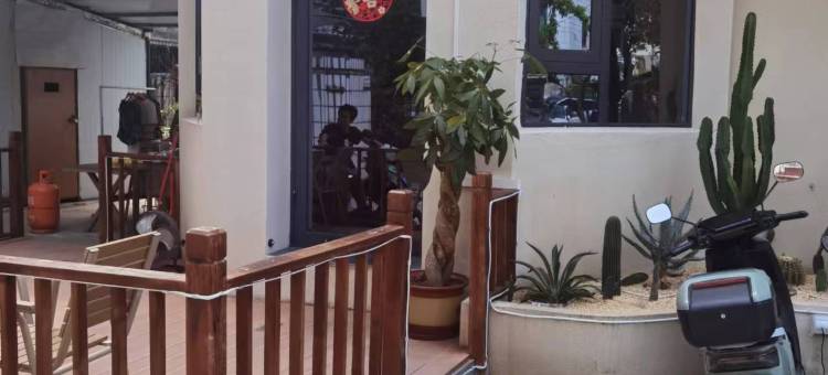 薪家民宿(海南大学店)图片