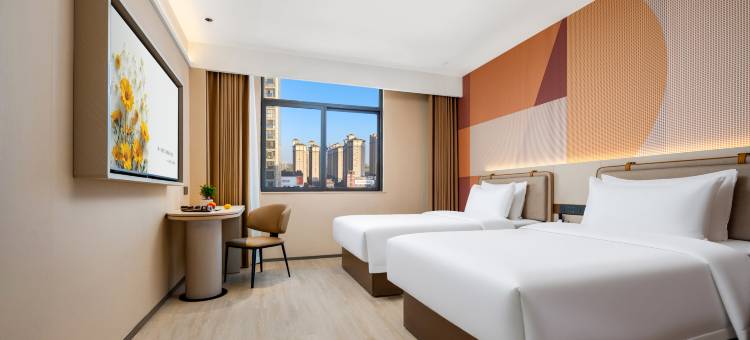 朋桔酒店(信阳高铁东站店)图片