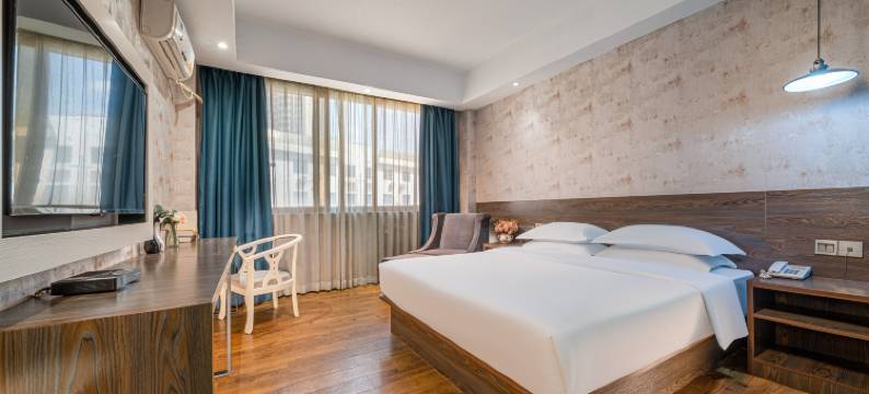 美凯时尚酒店(朝阳广场火车站店)图片