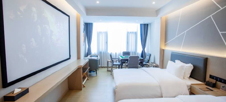 馨悦假日酒店(陆良图腾商业中心春光路店)图片