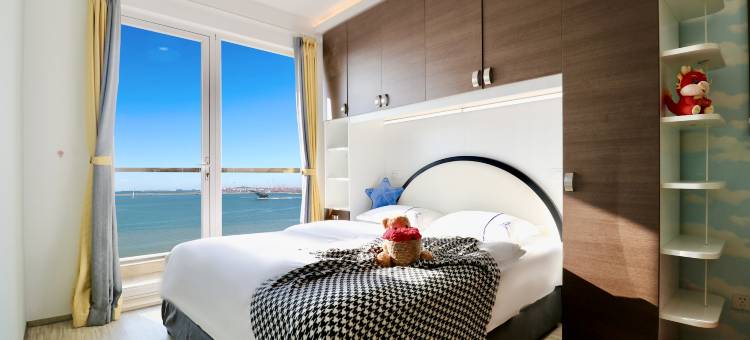 栖海·设计师魔法温泉主题海景公寓(山海广场店)图片