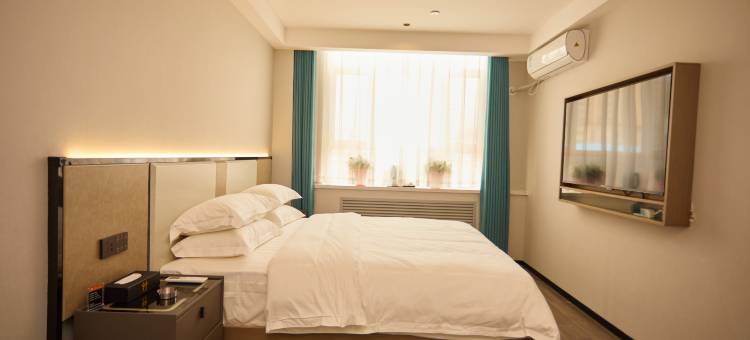 精河文华假日酒店图片