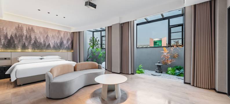 雅朵艺术酒店(潢川会展中心三环路店)图片