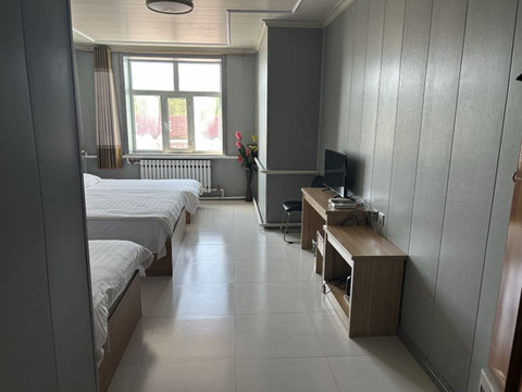 满归镇萨玛假日酒店