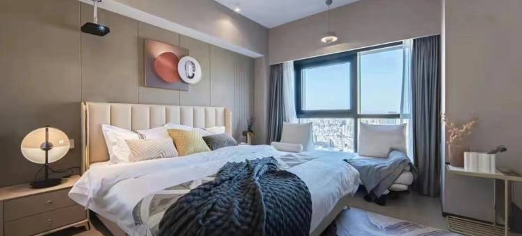 智美·轻居影音民宿(驻马店高铁西站凯旋广场店)图片