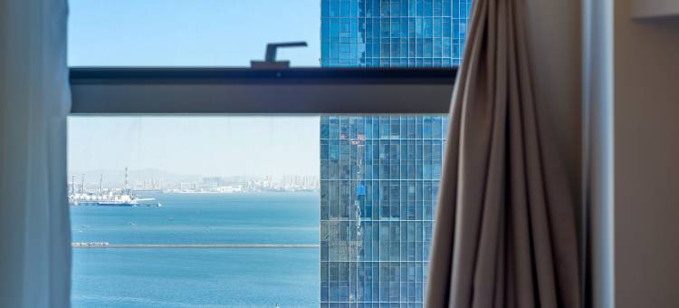 大连•悦朋｜HighRiseSeaViewApartment设计公寓(大连港湾广场店)图片