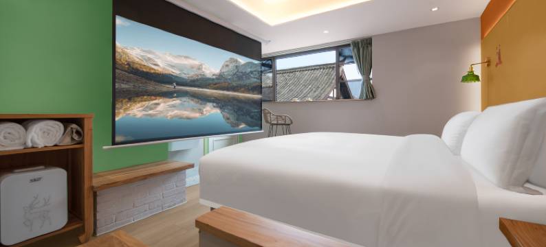 芊芊芒果树酒店(乐山大佛东大街美食街店)图片