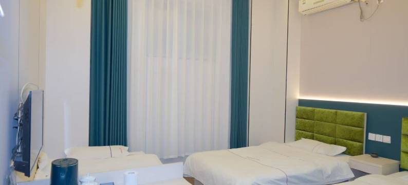 OYO郑州君子兰时尚酒店(高新郑州大学店)图片