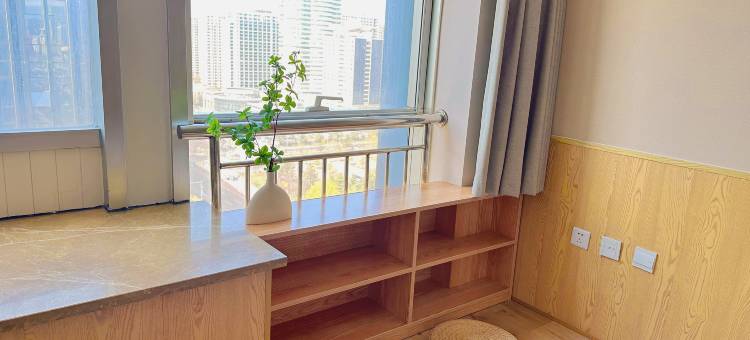 威海龙海国际公寓(高铁站韩乐坊店)图片