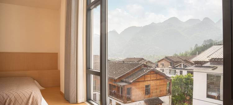 暮野山川宿(小七孔景区东门售票大厅店)图片