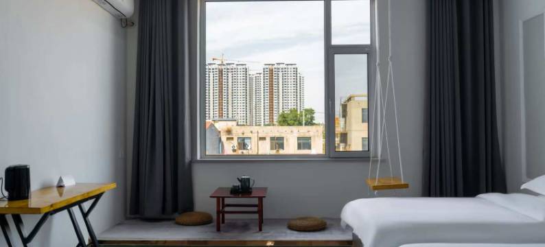 平遥半日闲民宿(平遥古城高铁站店)图片