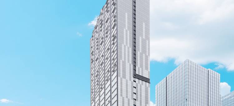 君逸海景酒店公寓(石老人国际会展中心店)图片