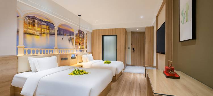 阜阳自然醒春季酒店(颍州文峰公园二里井夜市店)图片