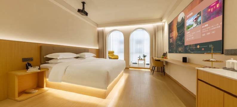 栖岸智能影院酒店(普定玉秀广场店)图片