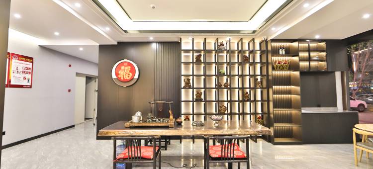 白城回家商务宾馆(火车站新华东大路店)图片