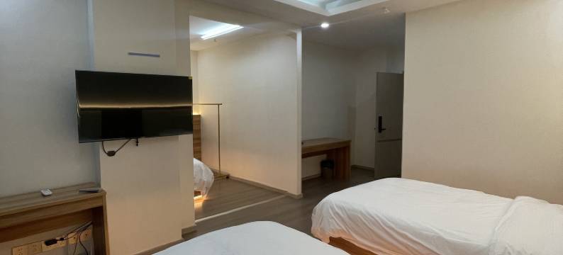 东兴海城商务酒店图片