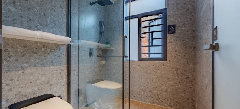 城小橙·AI智慧民宿(咸宁火车站店)图片