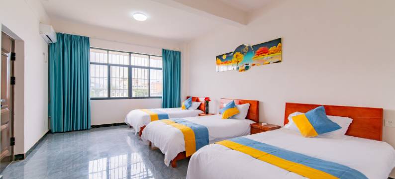 西双版纳景洪城悦·日月吉祥旅居民宿(嘎洒机场高铁站店)图片