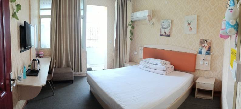 新港旅店(武汉纺织大学阳光校区江夏一中店)图片