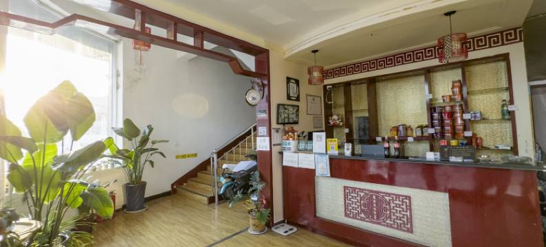 荣成东海岸商务宾馆(成山镇西霞口动物园店)图片