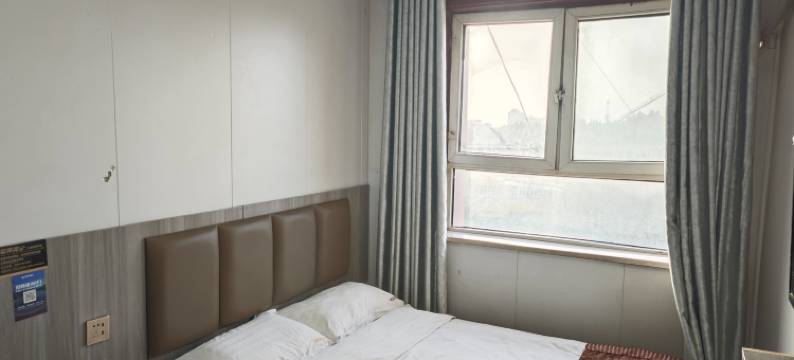 麦盖提川缘聚宾馆(卡龙情中央广场店)图片