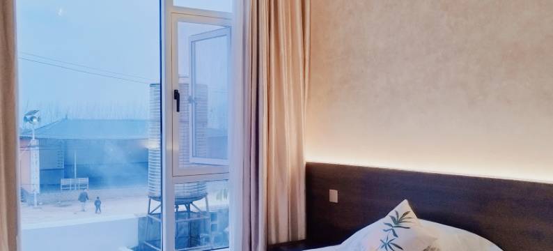 媛玺民宿(月亮湾湿地公园店)图片