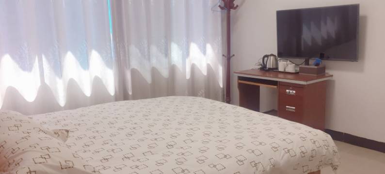 六盘水市钟山区昀扬酒店(凉都体育中心店)图片