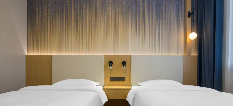 艺龙安云酒店(商丘高铁站第四高级中学店)图片