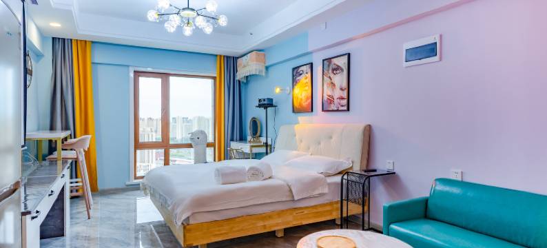 暖幢·艺术城宿(哈尔滨西站万达广场店)图片