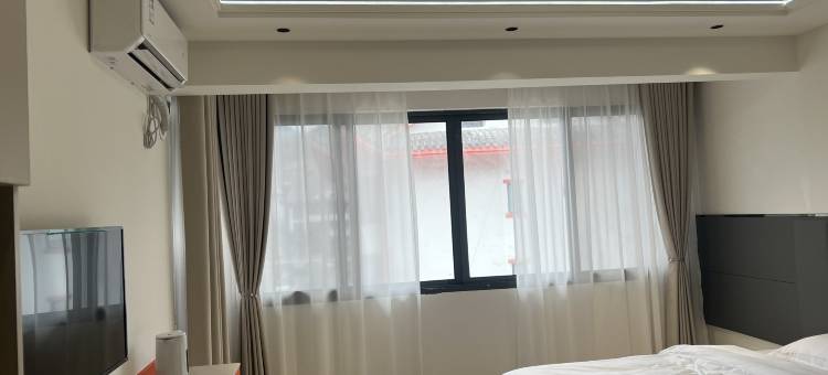 百里杜鹃花遇宾馆(鹏程路店)图片