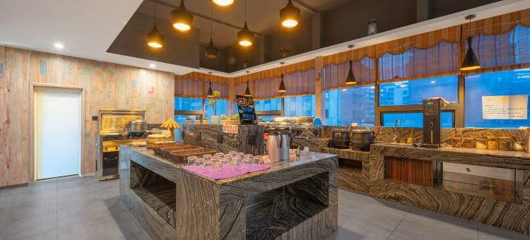 悦森·禧致酒店(城市中心广场老达一中店)图片